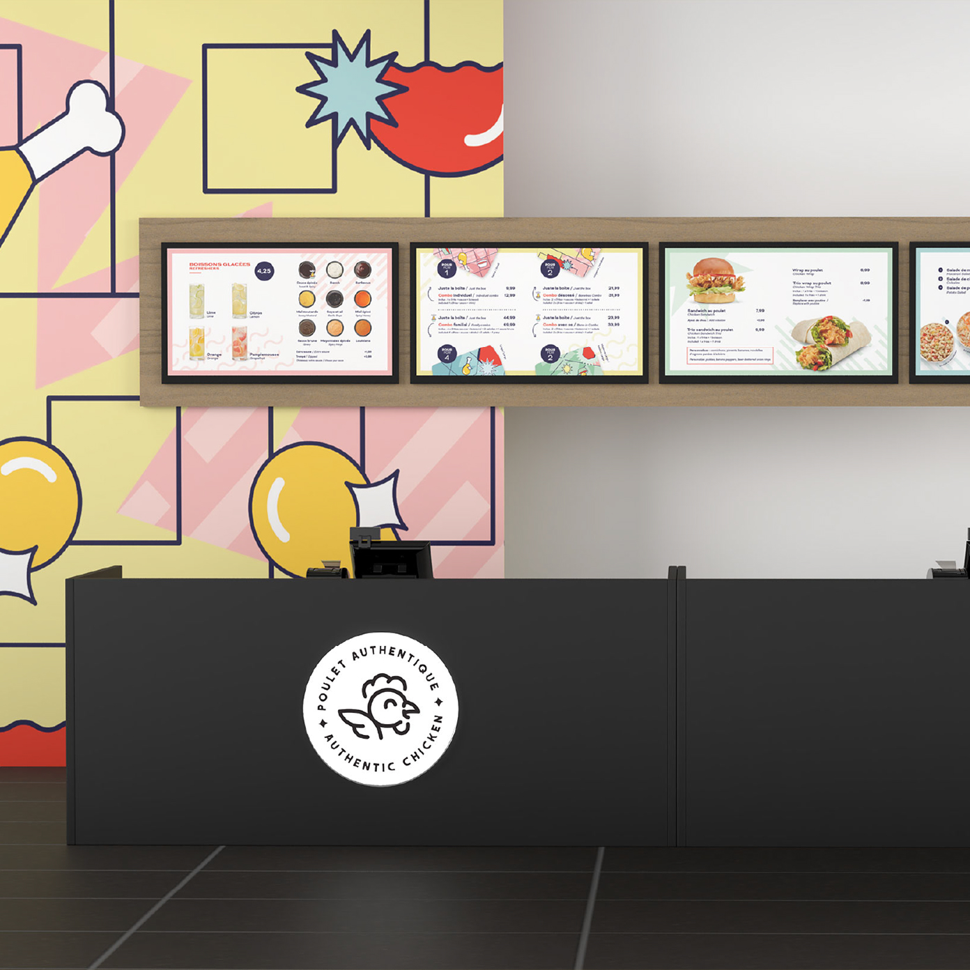 Un comptoir moderne de restaurant spécialisé dans le poulet, avec un mur coloré orné de pilons et de tomates dessinés, un comptoir noir arborant le logo d'Olivia’s Chicken, ainsi que des écrans numériques présentant une sélection de plats et de boissons à base de poulet.